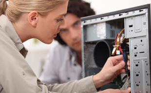 Woman fixing wire on CPU